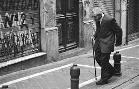 man in street with cane